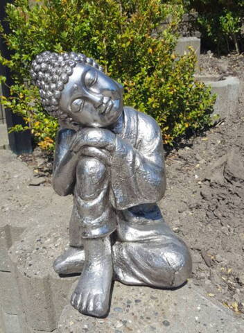 Buddha skulptur i sølv
