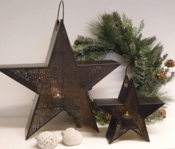 Stjerne lysestage i sort metal med hank